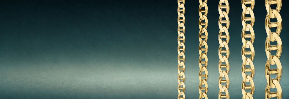 Yellow gold Mariner link chains on a dark teal background