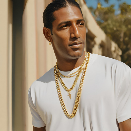 A man in a white shirt wearing Italian gold chain necklace | Italian Fashions